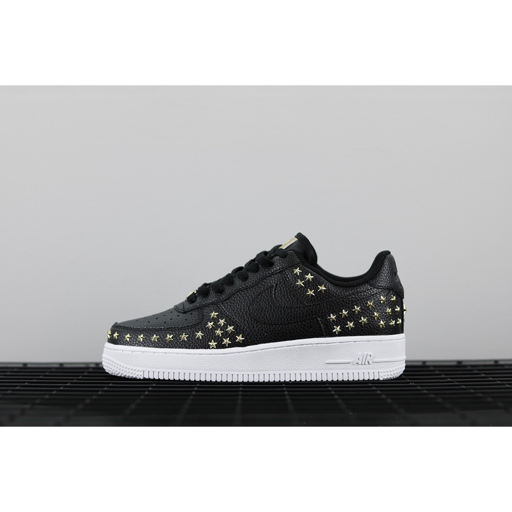 nike air force black with gold stars