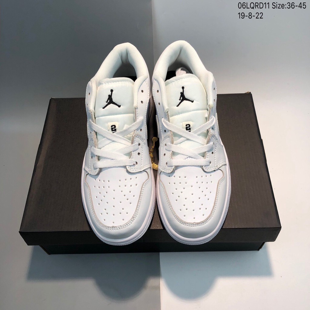 low cut white jordans