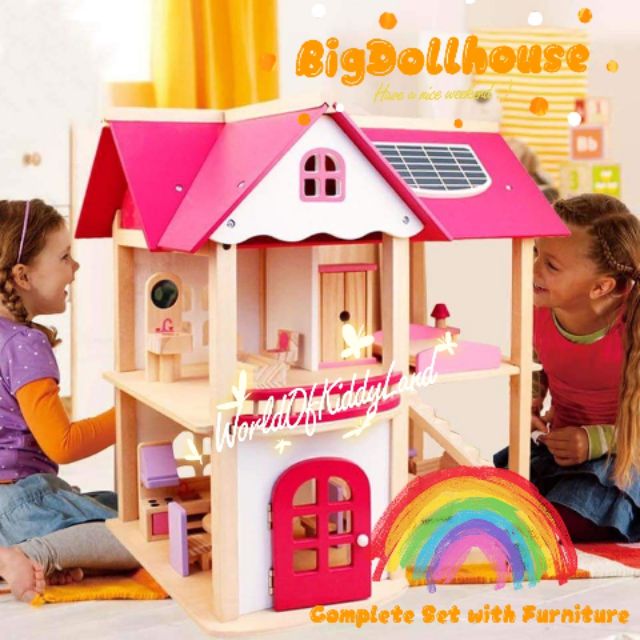 big wooden doll house