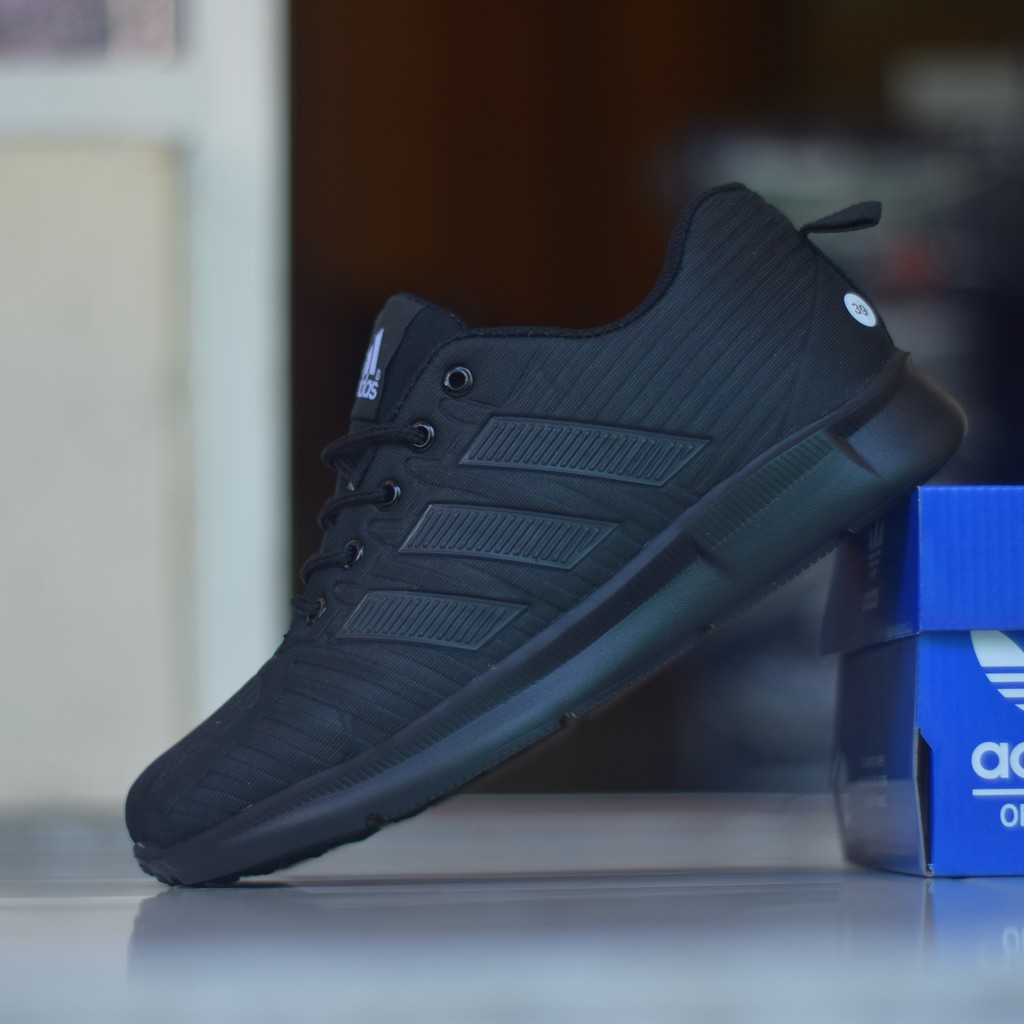 plain black adidas shoes