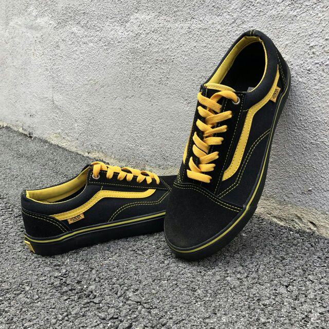 vans tnt yellow red black