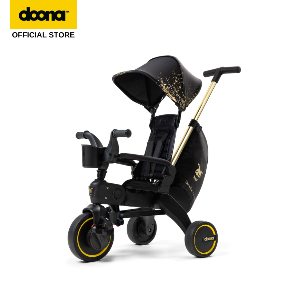 Doona Liki Trike Gold Limited Edition + Rain Cover 1 Year