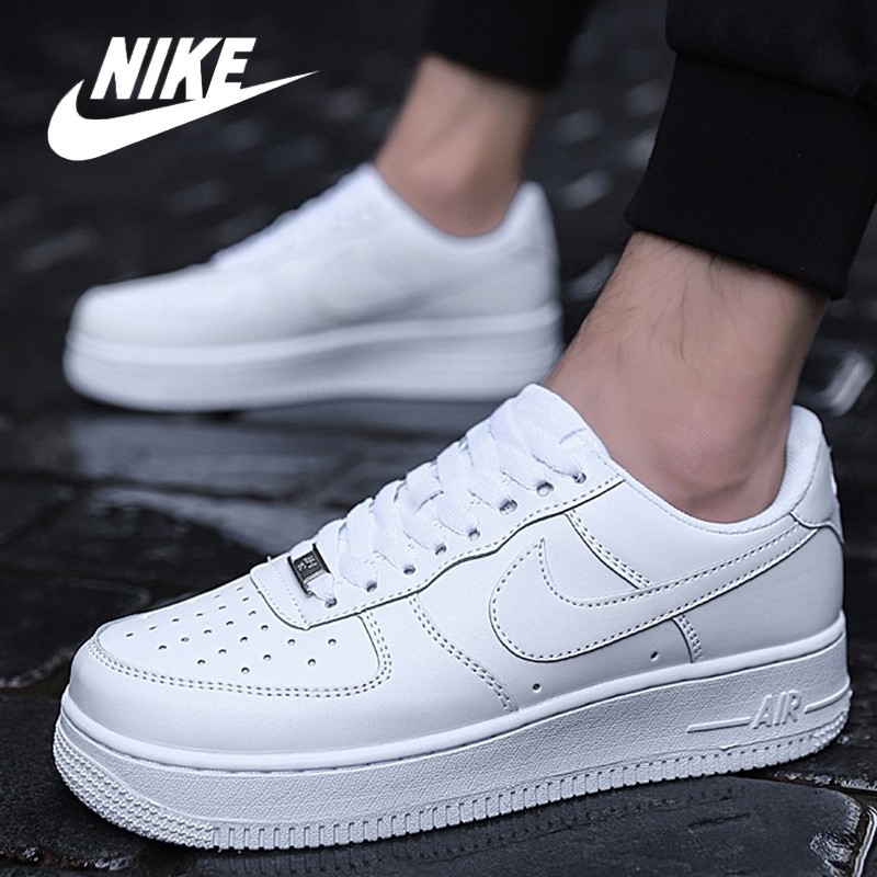 nike white shoes with gold tick