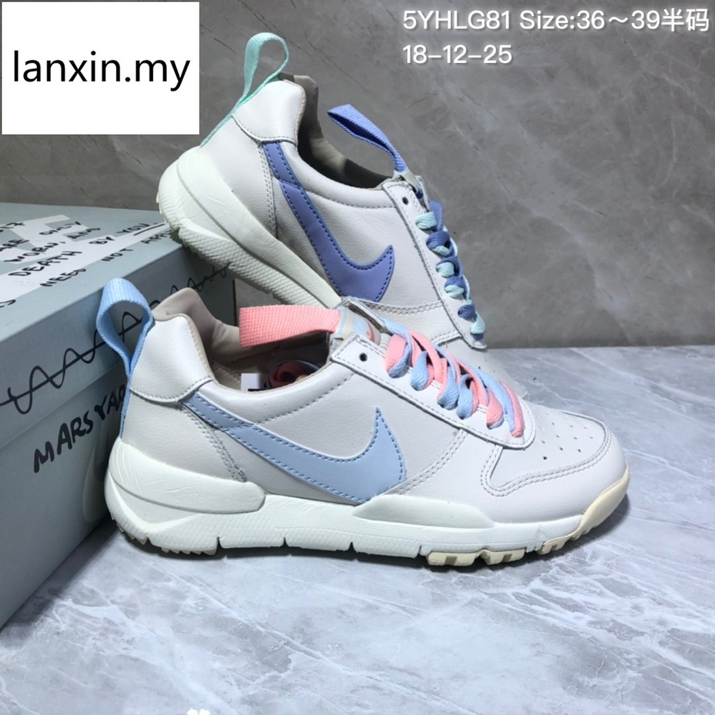 nike big swoosh shoes