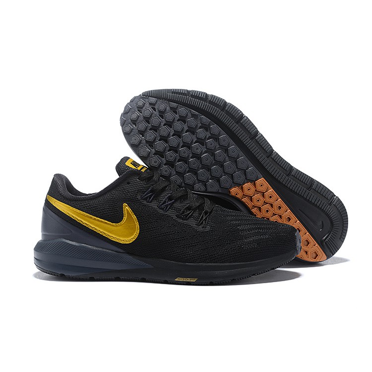 nike black and gold shoes