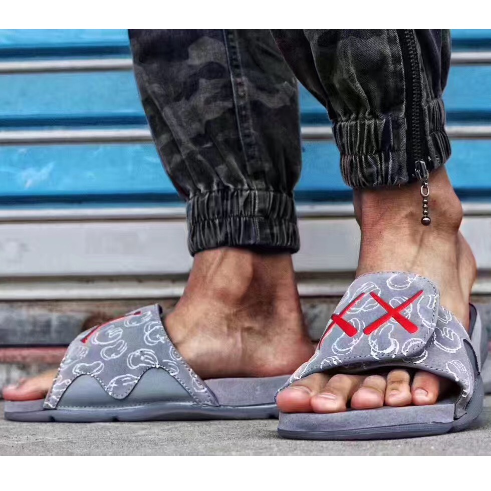 kaws jordan slides