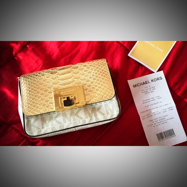 mk convertible clutch