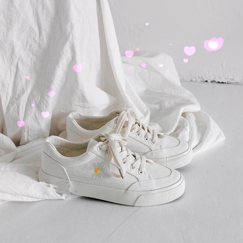 white cloth sneakers