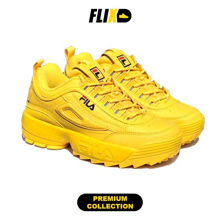 all yellow fila shoes