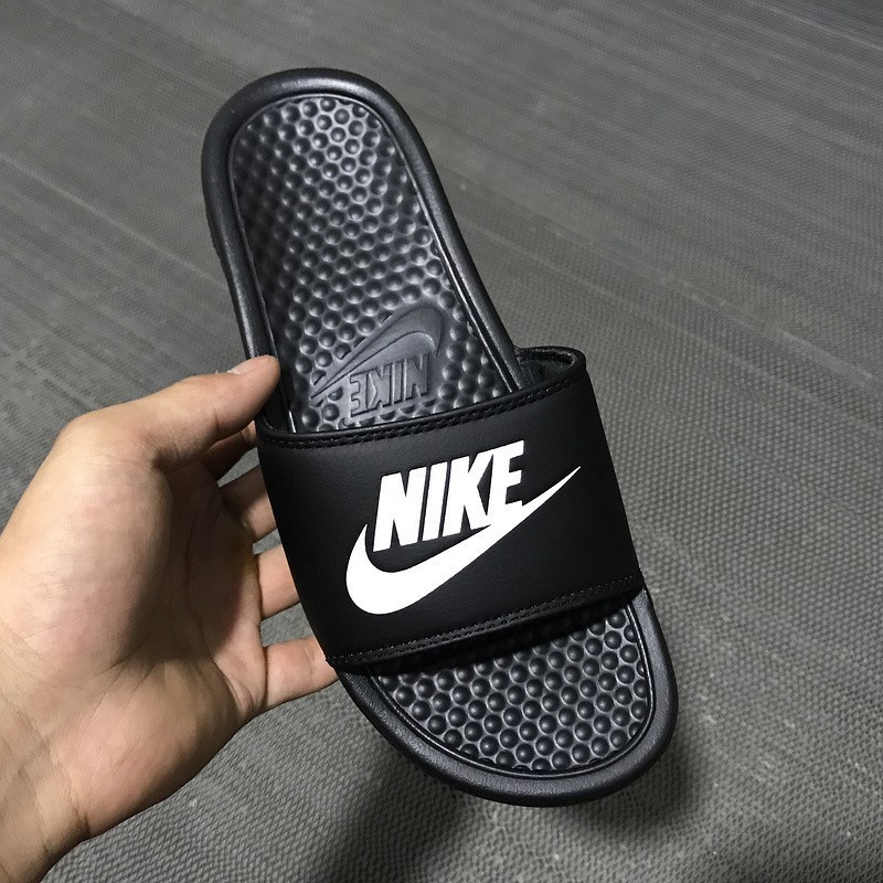 nike slippers price