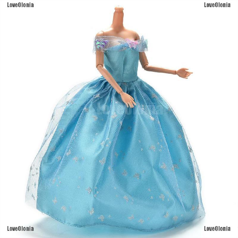 barbie doll in blue dress