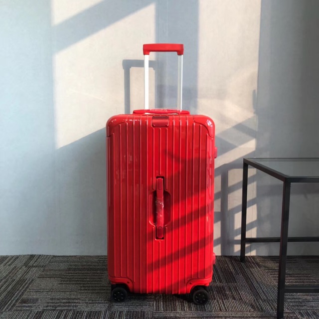 rimowa red luggage