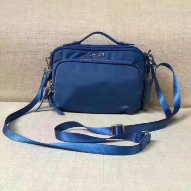 harga sling bag tumi original