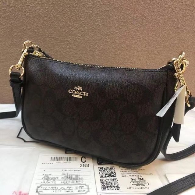 coach mini sling