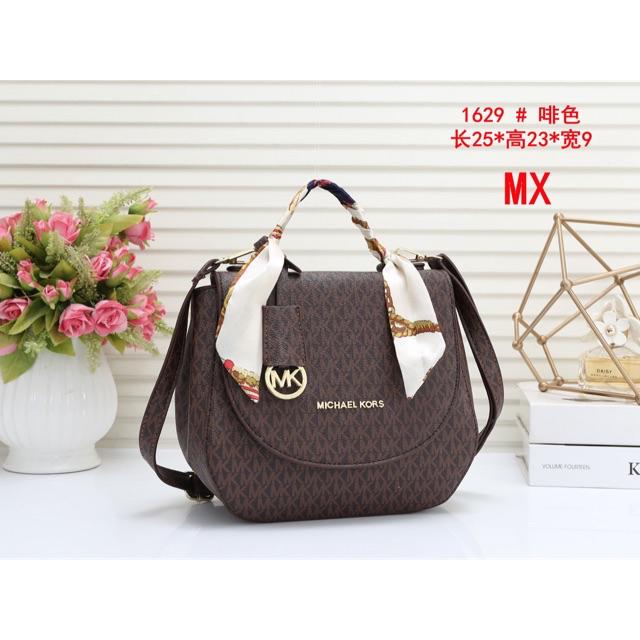 mk round sling bag