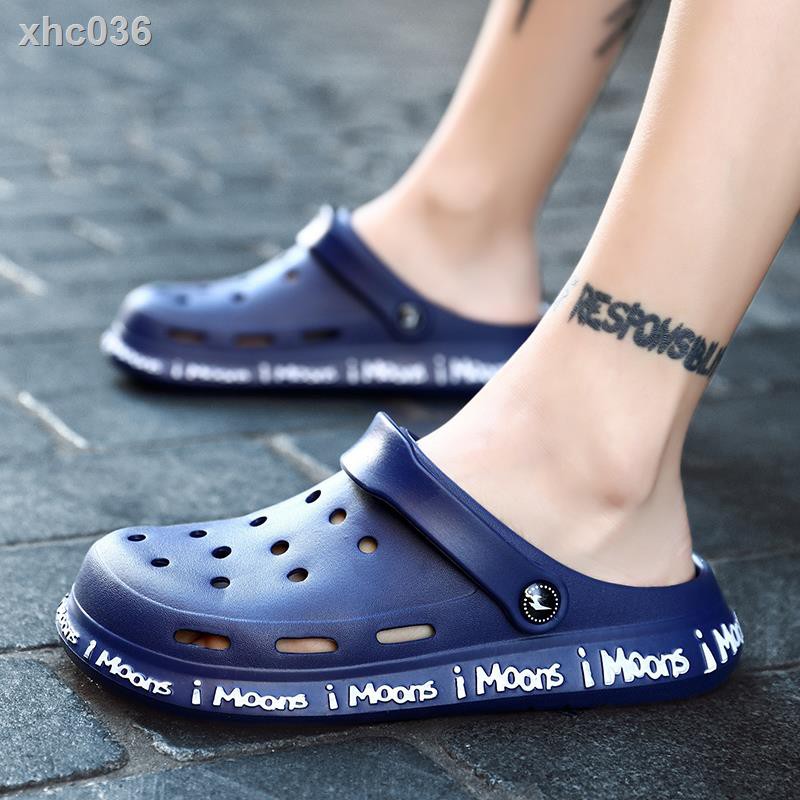 crocs on the beach