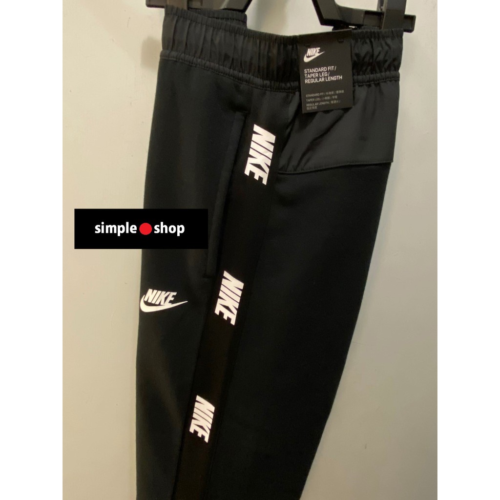 nike loose fit tapered leg regular length