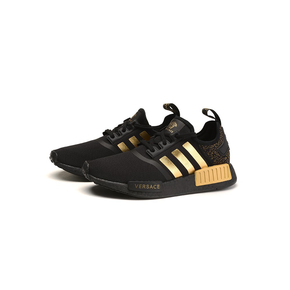 black and gold nmd