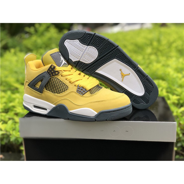 yellow black jordan 4