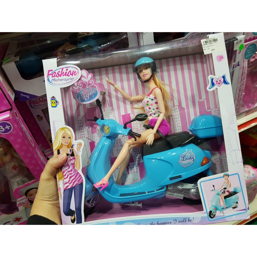 barbie doll and scooter