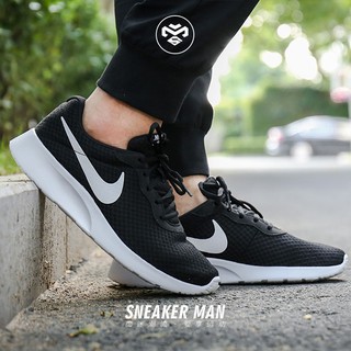 harga nike tanjun black