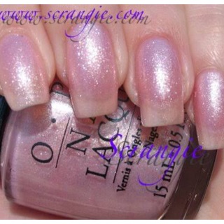 Opi Princess Rule, a pale pink Princess, clear base. Has a shimmer, wink and finely applied alone or over other colors, it is authentic% beautiful.