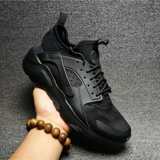 nike air huarache run triple black