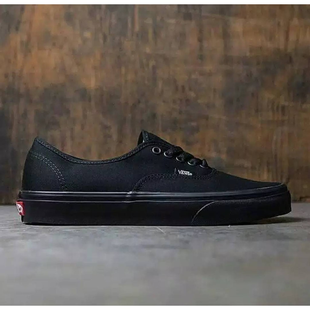 vans slip on full black original