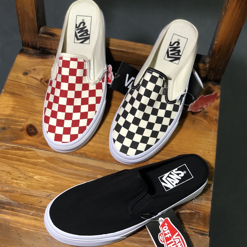 half black half white slip on vans