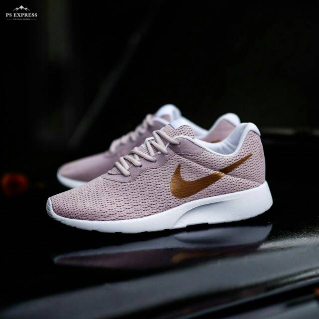 nike rose gold tanjun