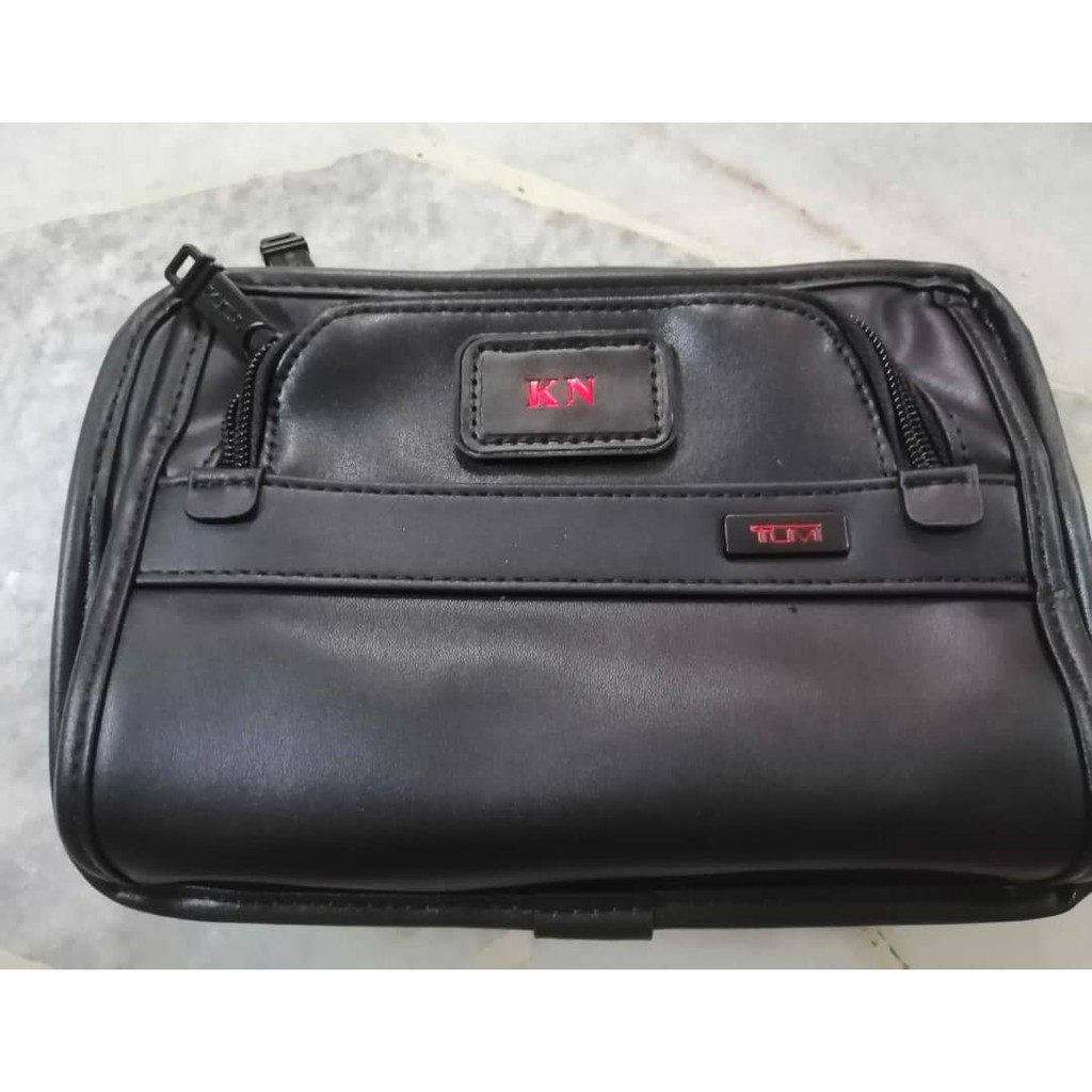 tumi clutch malaysia