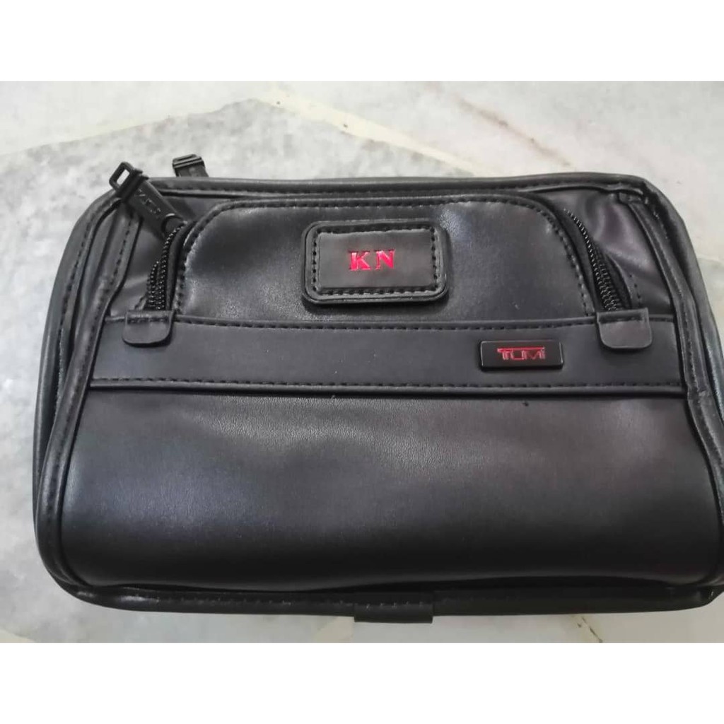 tumi clutch bag malaysia