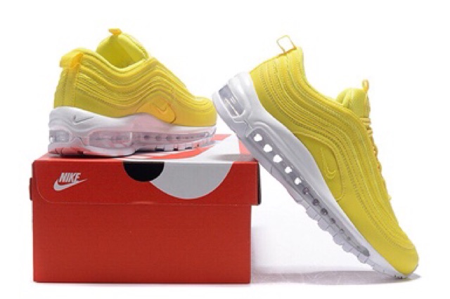 yellow nike 97s