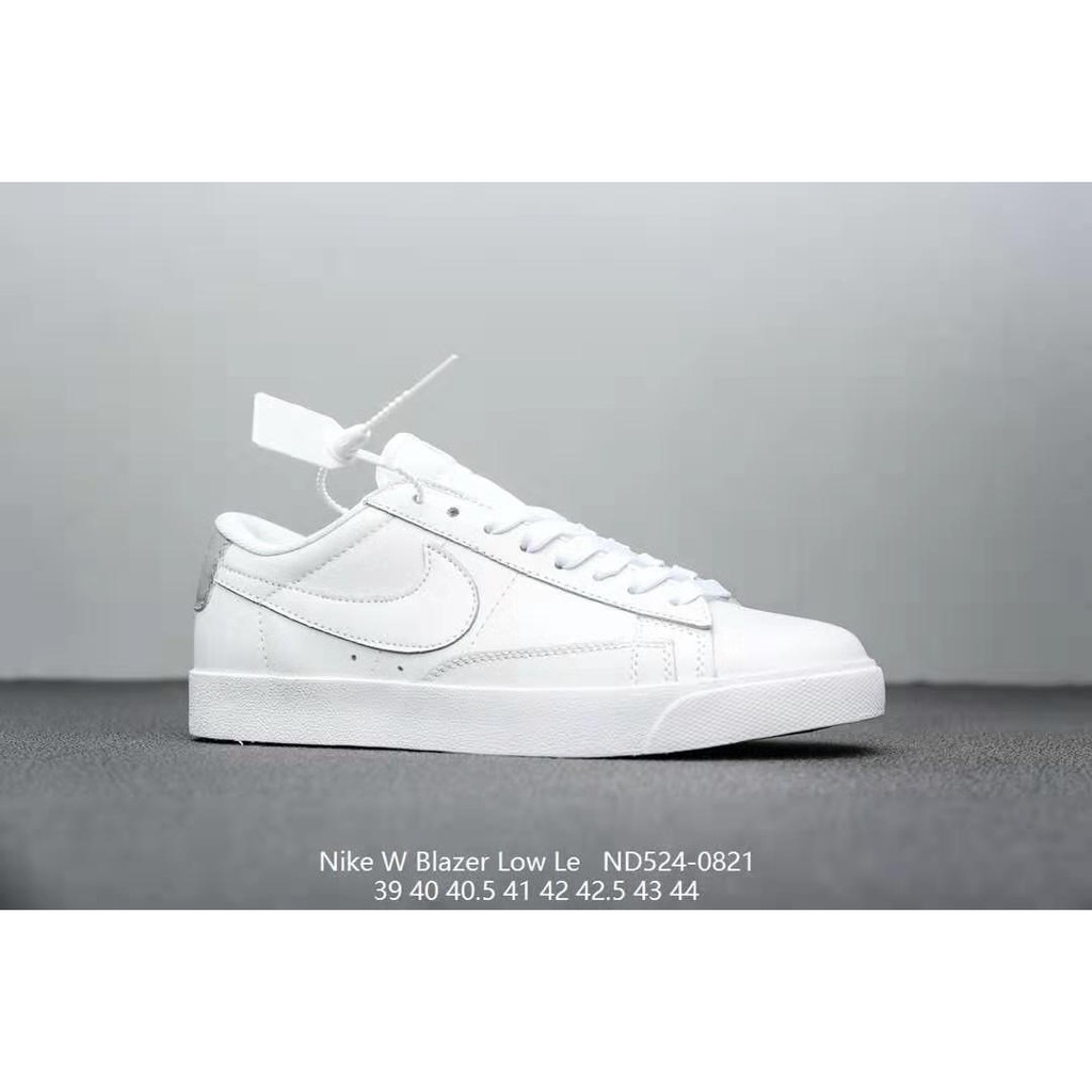 nike low cut white shoes