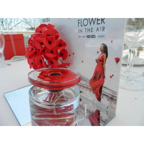 kenzo perfume flower in the air