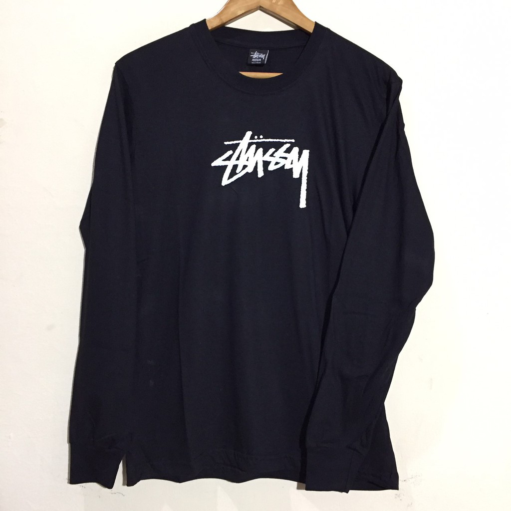 harga baju stussy