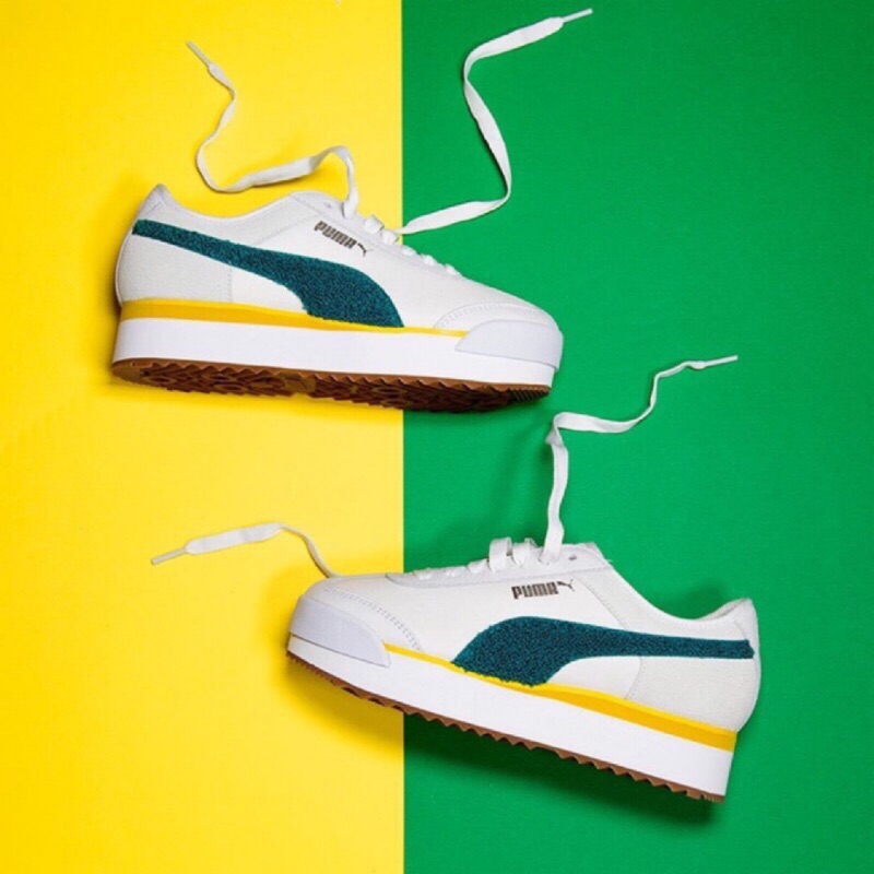green and yellow puma shoes
