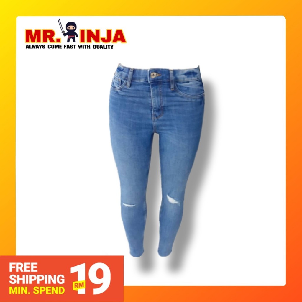 blue jeans with holes in them