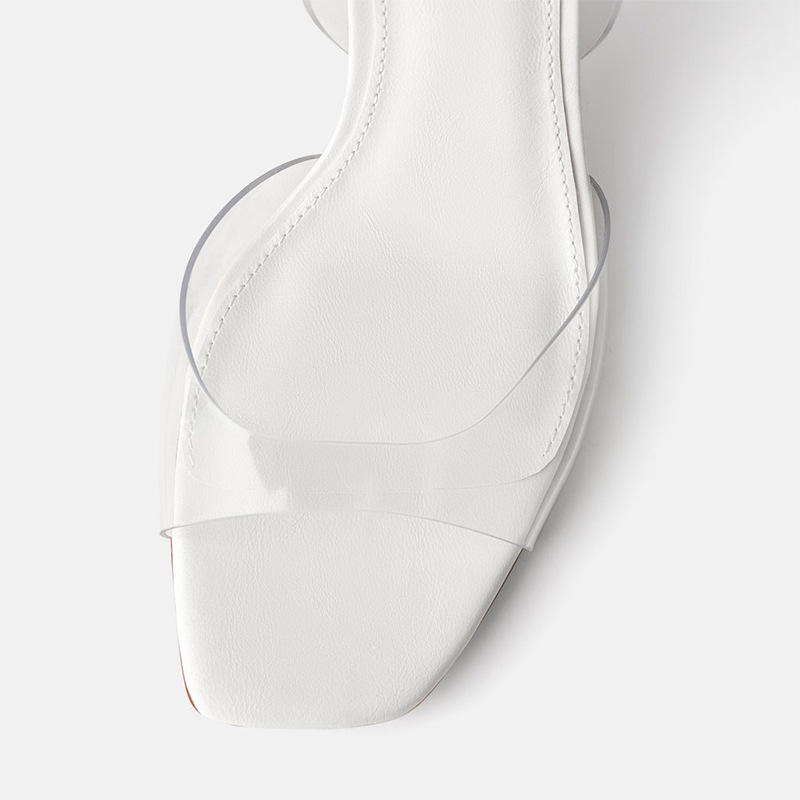 white plastic sandals