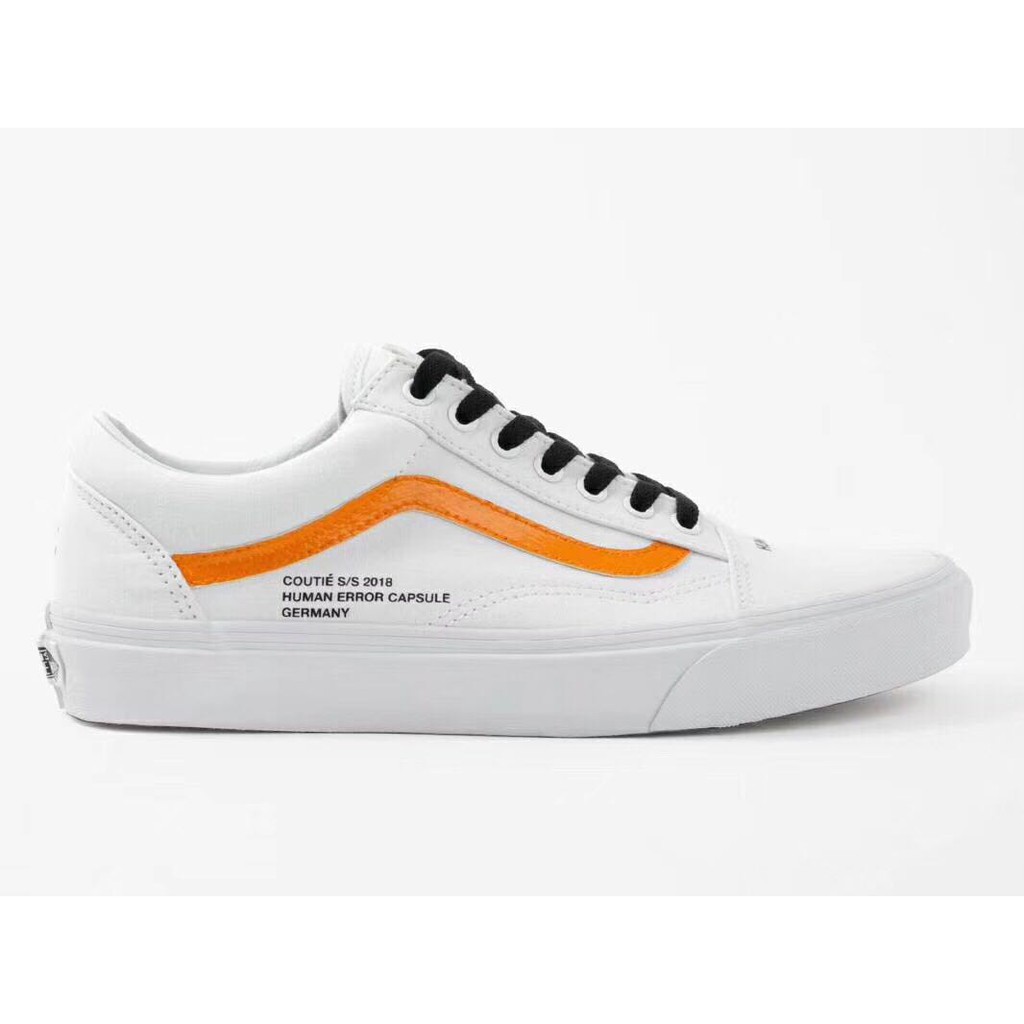 white and orange vans