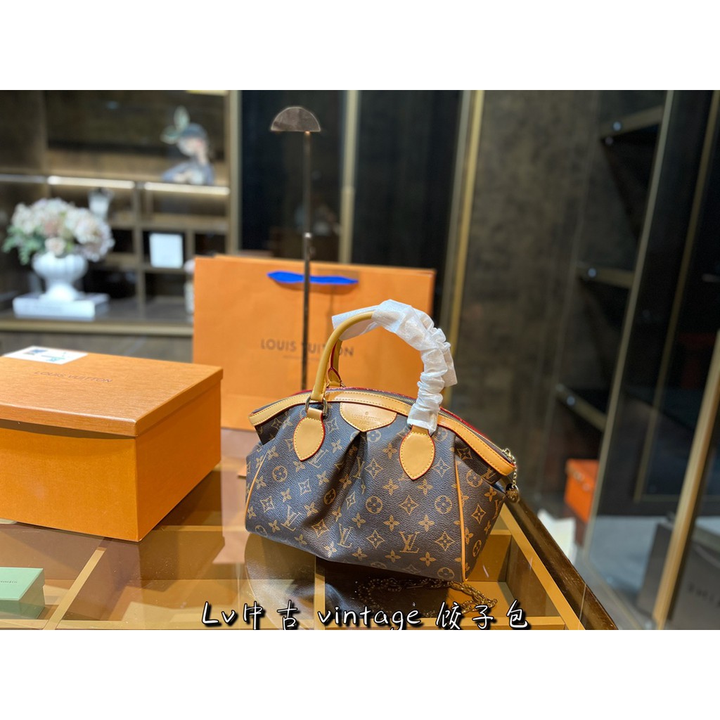 lv dumpling bag