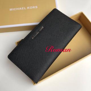 black and silver mk wallet