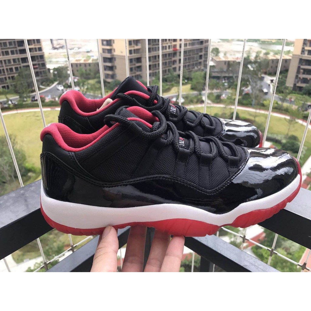 red low top jordan 11
