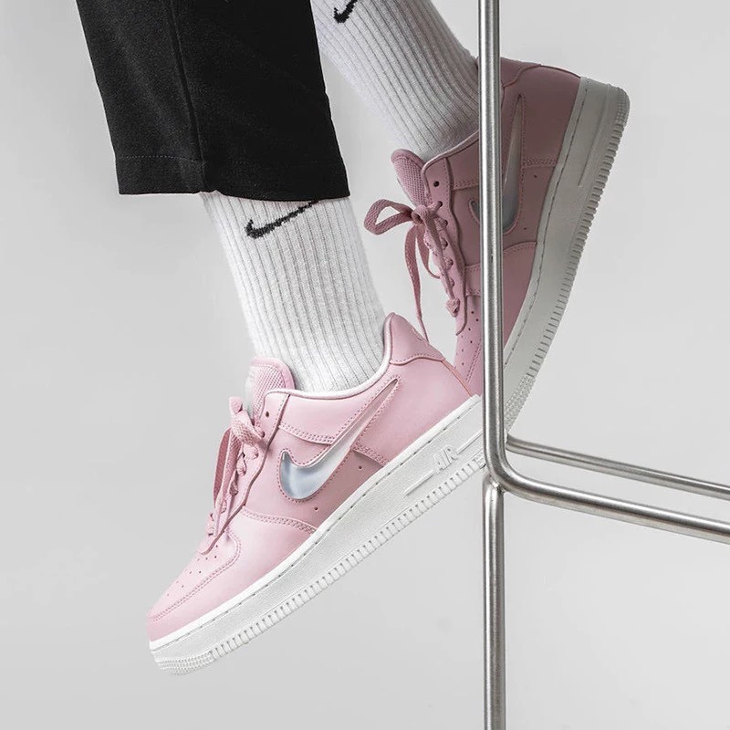 nike air force with pink swoosh