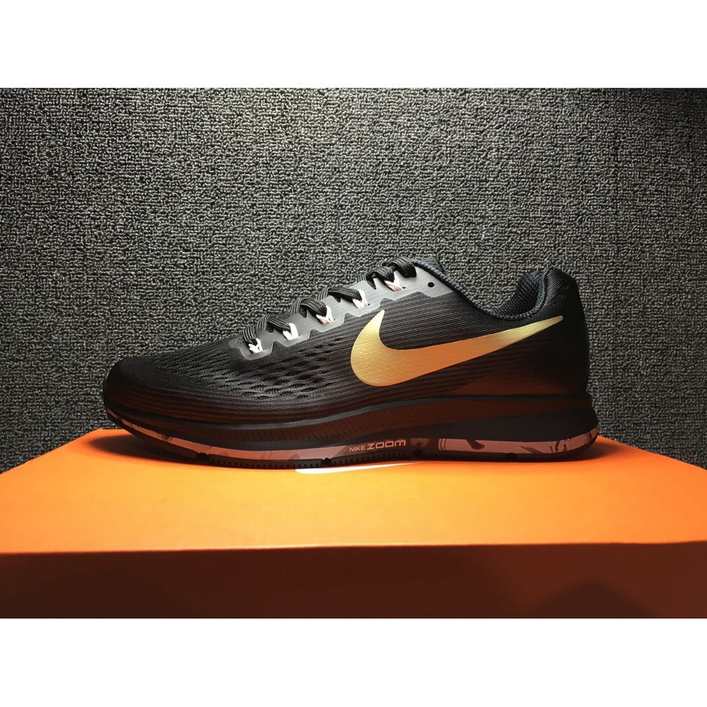 nike air zoom pegasus black and gold