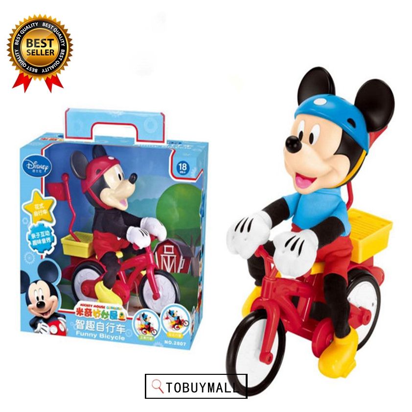 mickey mouse toy on bike