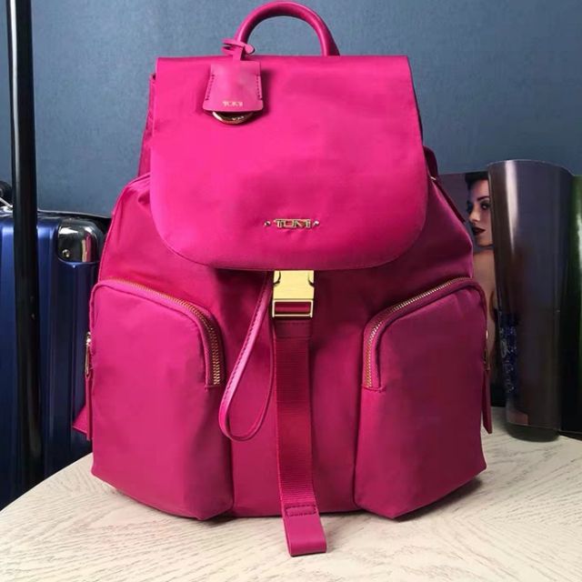 pink tumi backpack