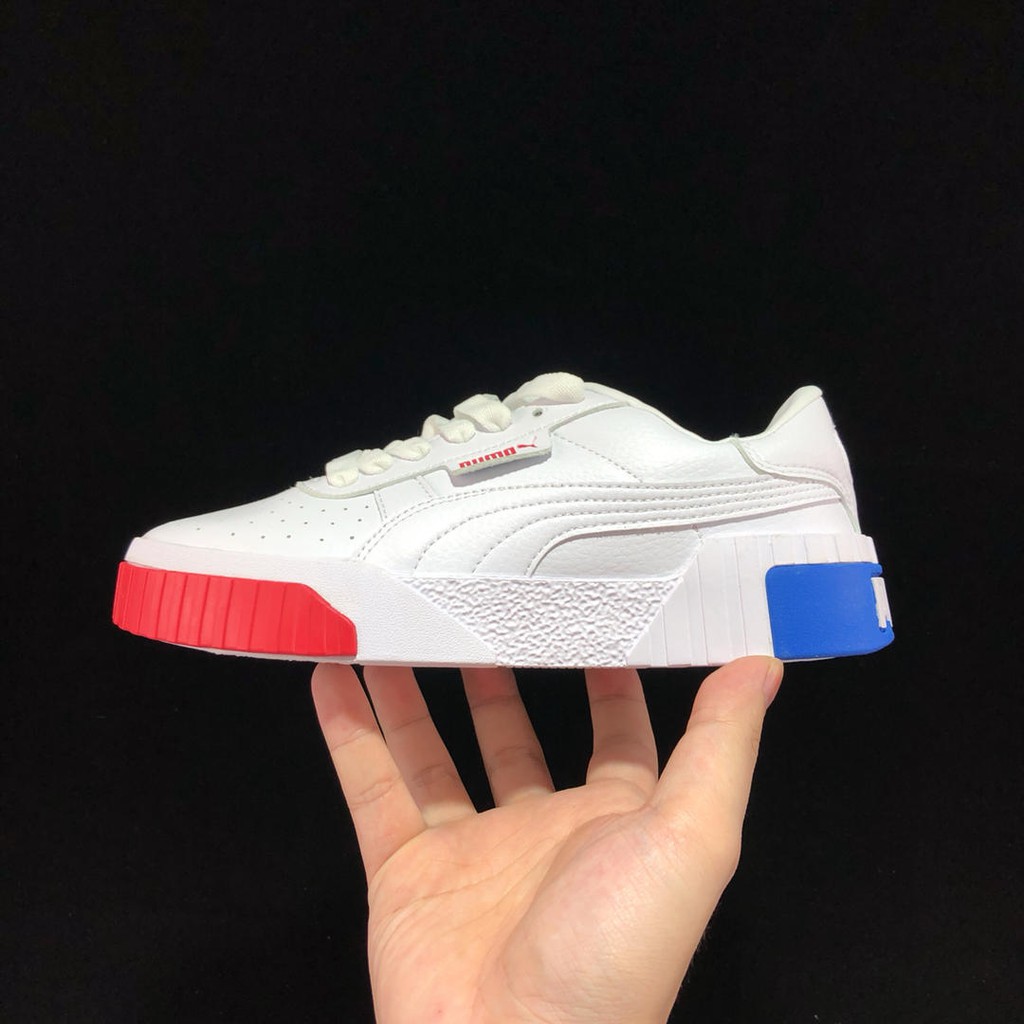 red and blue puma shoes