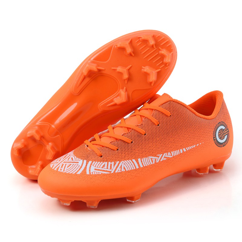 boys orange football boots