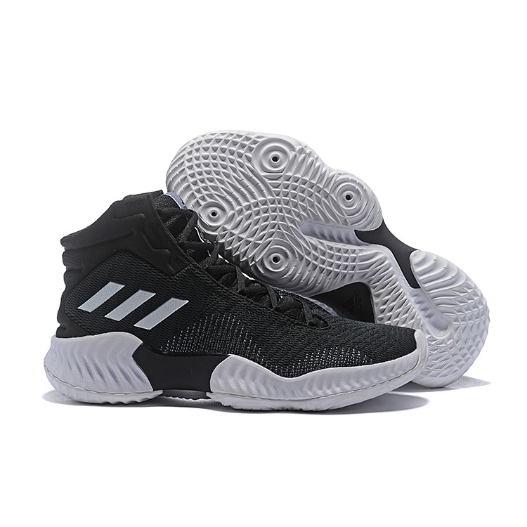 white and black adidas basketball shoes